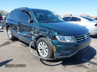 2018 Volkswagen Tiguan S z VIN 3VV0B7AX4JM201009, wystawiony jako IAAI lot #42226969 z przebiegiem 92 825 mil mil oraz . Historia ofert i sprzedaży dostępna na DreamBid. Obrazek 1.