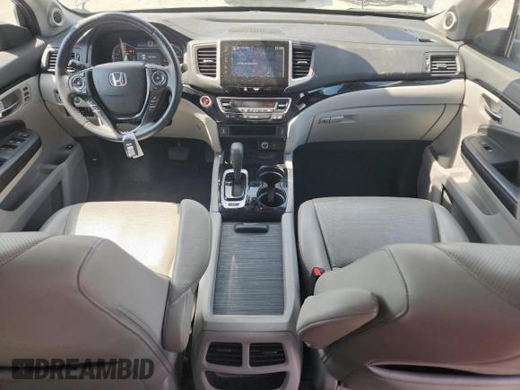 2017 Honda Ridgeline RTL-E with VIN 5FPYK3F79HB031142, listed as a Copart auction lot 62365885 with 134,517 mi miles and Salvage title. Bid and sale history available at DreamBid. Image 8.