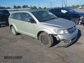2014 Dodge Journey American Value with VIN 3C4PDCAB2ET259183, listed as a IAAI auction lot 42207868 with 132,564 mi miles and . Bid and sale history available at DreamBid. Image 1.