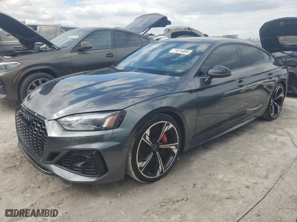 2024 Audi RS 5 Sportback with VIN WUAAWCF54RA900689, listed as a Copart auction lot 77674404 with 7,496 mi miles and Non Repairable. Bid and sale history available at carsss.com. Image 1.