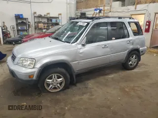 2001 Honda CR-V SE z VIN JHLRD18721C003889, wystawiony jako Copart lot #57477885 z przebiegiem 231 359 mil mil oraz Szkoda całkowita • Salvage title. Historia ofert i sprzedaży dostępna na DreamBid. Obrazek 1.