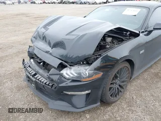 2019 Ford Mustang GT with VIN 1FA6P8CF7K5119339, listed as a IAAI auction lot 41765669 with 27,936 mi miles and . Bid and sale history available at carsss.com. Image 6.