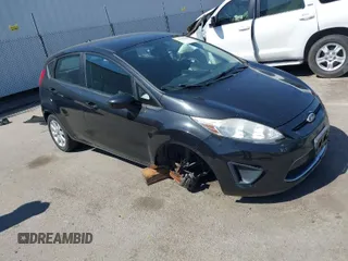 2011 Ford Fiesta SE with VIN 3FADP4EJ5BM225977, listed as a IAAI auction lot 41756269 with 120,203 mi miles. Bid and sale history available at carsss.com. Image 1.