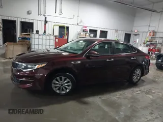 2016 Kia Optima LX with VIN 5XXGT4L3XGG073744, listed as a IAAI auction lot 41586212 with 111,628 mi miles. Bid and sale history available at carsss.com. Image 14.