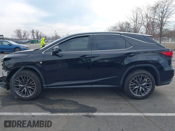 2020 Lexus RX with VIN 2T2SZMDA8LC256854, listed as a IAAI auction lot 41822801 with 74,814 mi miles. Bid and sale history available at carsss.com. Image 14.