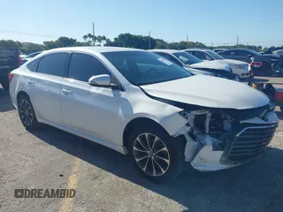 2016 Toyota Avalon Limited with VIN 4T1BK1EB1GU207322, listed as a IAAI auction lot 42030270 with 77,127 mi miles. Bid and sale history available at carsss.com. Image 1.
