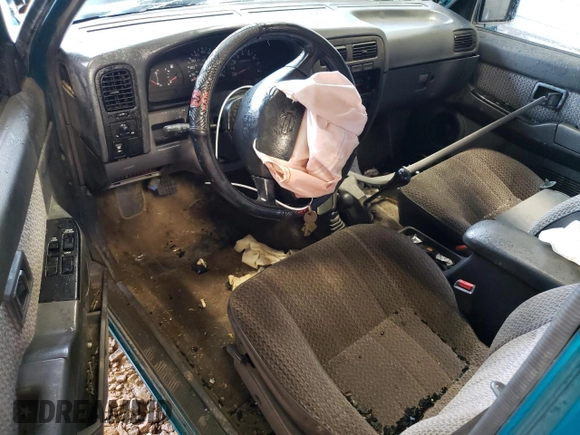 1997 Nissan Frontier XE with VIN 1N6SD16Y2VC338776, listed as a Copart auction lot 45020595 with 243,030 mi miles and Salvage title. Bid and sale history available at DreamBid. Image 8.
