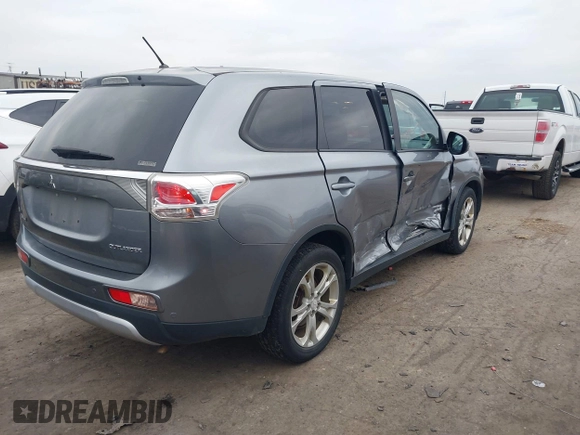 2015 Mitsubishi Outlander SE with VIN JA4AZ3A39FZ007936, listed as a IAAI auction lot 41003206 with 136,017 mi miles and . Bid and sale history available at DreamBid. Image 4.