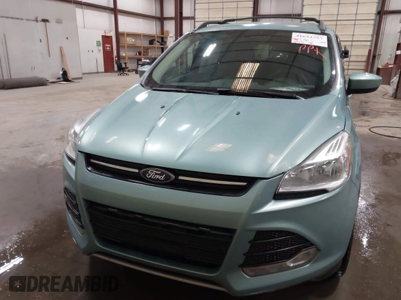 2013 Ford Escape SE with VIN 1FMCU0GX9DUB40739, listed as a IAAI auction lot 41633757 with 87,522 mi miles and . Bid and sale history available at DreamBid. Image 12.