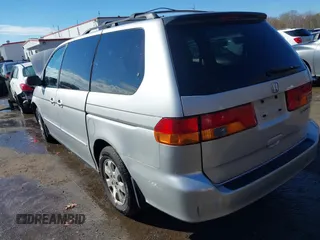 2004 Honda Odyssey EX z VIN 5FNRL18674B080319, wystawiony jako IAAI lot #40819411 z przebiegiem 201 820 mil mil oraz . Historia ofert i sprzedaży dostępna na DreamBid. Obrazek 3.
