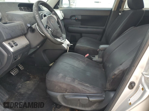 2009 Scion xB with VIN JTLKE50E691081245, listed as a Copart auction lot 53803235 with 243,395 mi miles and Salvage Title. Bid and sale history available at DreamBid. Image 7.