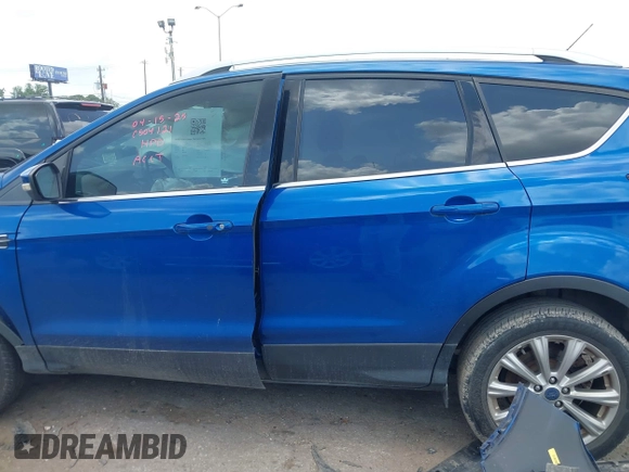 2017 Ford Escape Titanium with VIN 1FMCU0JD3HUE35131, listed as a IAAI auction lot 42062019 with 108,470 mi miles and . Bid and sale history available at DreamBid. Image 15.