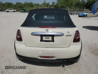 2014 MINI Convertible с VIN WMWZN3C56ET569651, выставлен на аукционе Copart как лот 66455675 с пробегом 117 994 миль миль и Списание • Salvage title. История ставок и продаж доступна на DreamBid. Изображение 6.