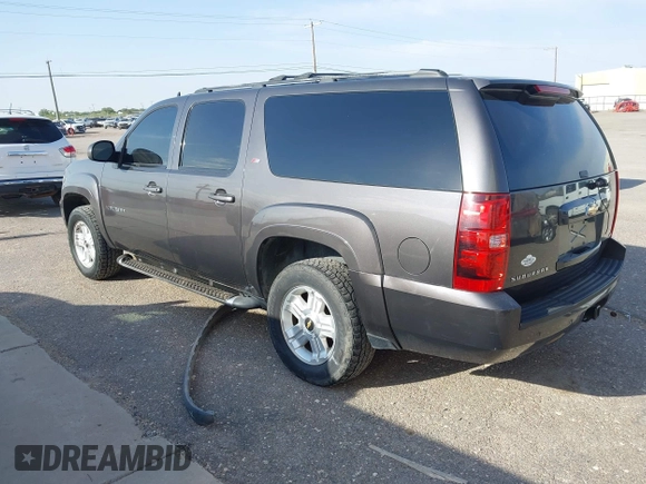 2011 Chevrolet Suburban LT with VIN 1GNSKJE34BR242629, listed as a IAAI auction lot 42043276 with 197,722 mi miles and . Bid and sale history available at DreamBid. Image 3.