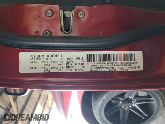 2012 Ram 1500 Tradesman with VIN 1C6RD6KP2CS296003, listed as a Copart auction lot 82170314 with 136,216 mi miles and Salvage title. Bid and sale history available at DreamBid. Image 12.