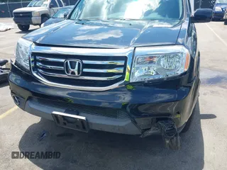 2013 Honda Pilot Touring z VIN 5FNYF3H98DB023104, wystawiony jako IAAI lot #42310538 z przebiegiem 169 385 mil mil oraz . Historia ofert i sprzedaży dostępna na DreamBid. Obrazek 6.