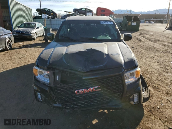 2021 GMC Canyon 4WD AT4 w/Cloth with VIN 1GTG6FEN9M1254293, listed as a Copart auction lot 87163874 with 33,645 mi miles and Salvage Title. Bid and sale history available at carsss.com. Image 5.