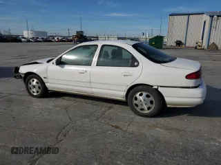 1999 Mercury Mystique GS z VIN 1MEFM653XXK629587, wystawiony jako Copart lot #78900204 z przebiegiem 139 060 mil mil oraz Szkody całkowita. Historia ofert i sprzedaży dostępna na DreamBid. Obrazek 2.