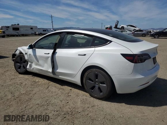 2023 Tesla Model 3 with VIN 5YJ3E1EA0PF623233, listed as a Copart auction lot 55781355 with 26,301 mi miles and Salvage title. Bid and sale history available at DreamBid. Image 2.