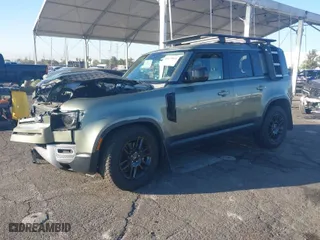 2024 Land Rover Defender S with VIN SALEJ7EX2R2286347, listed as a IAAI auction lot 40679843 with 7,669 mi miles. Bid and sale history available at carsss.com. Image 2.