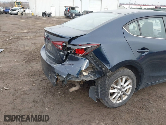 2014 Mazda 3 i Touring with VIN JM1BM1V7XE1170425, listed as a IAAI auction lot 41557903 with 111,946 mi miles and . Bid and sale history available at DreamBid. Image 6.