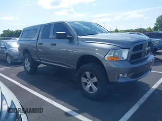 2012 Ram 1500 Express with VIN 1C6RD7FT0CS209180, listed as a IAAI auction lot 42448301 with 112,220 mi miles and . Bid and sale history available at DreamBid. Image 1.