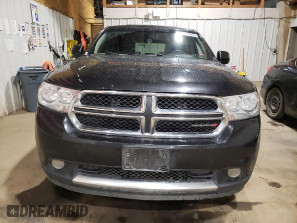 2012 Dodge Durango Crew with VIN 1C4SDJDT0CC323006, listed as a Copart auction lot 63631985 with 126,521 mi miles and Salvage title. Bid and sale history available at DreamBid. Image 5.