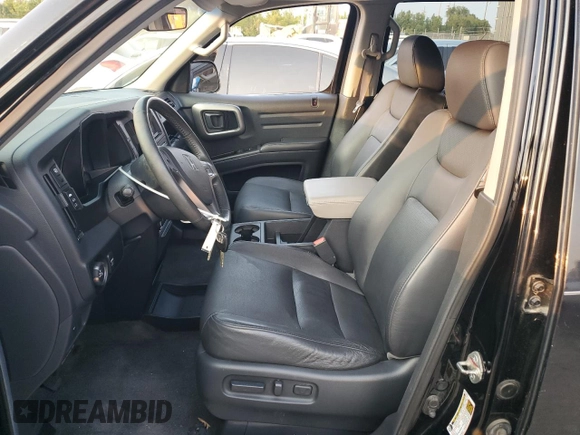 2010 Honda Ridgeline RTL with VIN 5FPYK1F52AB008326, listed as a Copart auction lot 71120074 with 157,688 mi miles and Salvage Title. Bid and sale history available at carsss.com. Image 7.