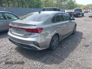 2022 Kia Forte GT-Line z VIN 3KPF54AD0NE490720, wystawiony jako IAAI lot #42168294 z przebiegiem 25 875 mil mil oraz . Historia ofert i sprzedaży dostępna na DreamBid. Obrazek 4.
