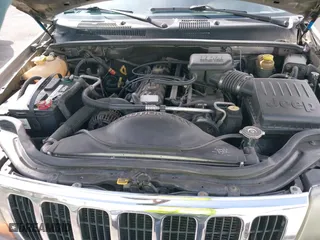 2001 Jeep Grand Cherokee Laredo with VIN 1J4GW48S81C708484, listed as a IAAI auction lot 41907414 with 1 mi miles. Bid and sale history available at carsss.com. Image 10.