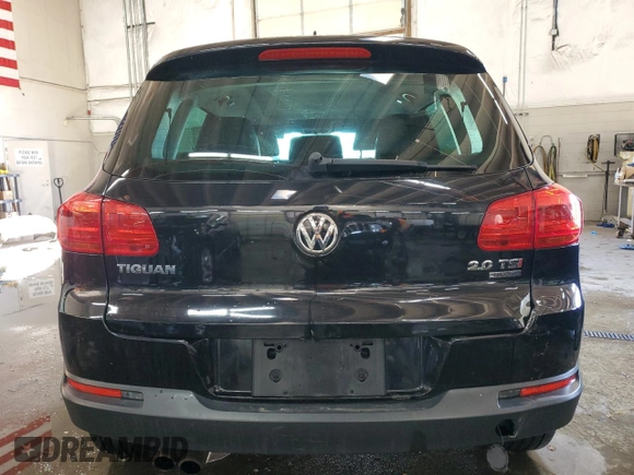 2013 Volkswagen Tiguan SE z VIN WVGBV7AX9DW529234, wystawiony jako Copart lot #41610635 z przebiegiem 130 566 mil mil oraz Szkoda całkowita • Salvage title. Historia ofert i sprzedaży dostępna na DreamBid. Obrazek 6.