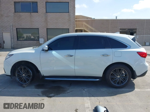 2016 Acura MDX w/Tech with VIN 5FRYD4H47GB045999, listed as a IAAI auction lot 42041010 with 124,096 mi miles. Bid and sale history available at carsss.com. Image 14.