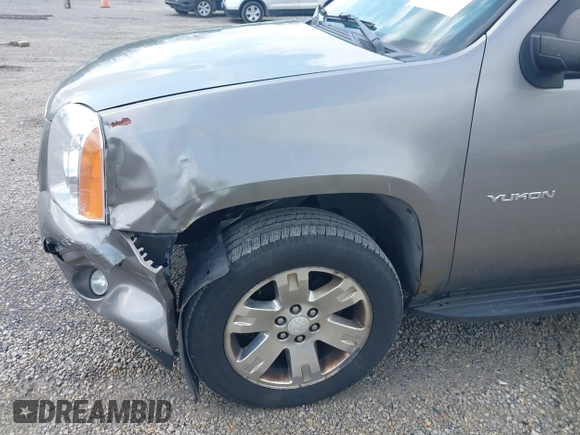 2007 GMC Yukon SLT z VIN 1GKFK13077R129885, wystawiony jako IAAI lot #42184207 z przebiegiem 264 848 mil mil oraz . Historia ofert i sprzedaży dostępna na DreamBid. Obrazek 17.