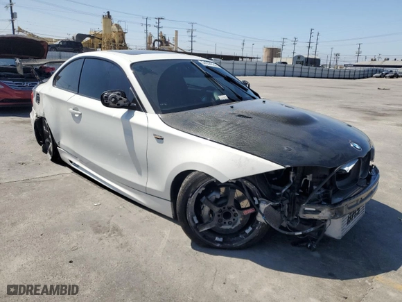 2013 BMW 1 Series 135i with VIN WBAUC9C52DVY60105, listed as a Copart auction lot 54638624 with 0 mi miles and Salvage Title. Bid and sale history available at carsss.com. Image 4.