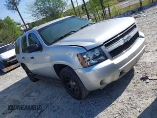 2013 Chevrolet Tahoe Commercial z VIN 1GNLC2E03DR124278, wystawiony jako IAAI lot #39201429 z przebiegiem 182 584 mil mil oraz . Historia ofert i sprzedaży dostępna na DreamBid. Obrazek 1.