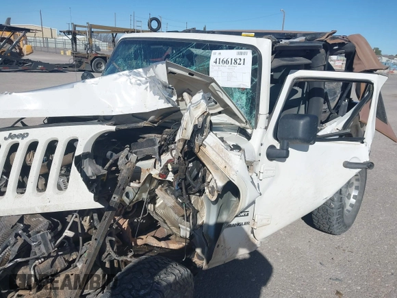 2010 Jeep Wrangler Mountain with VIN 1J4AA2D14AL173286, listed as a IAAI auction lot 41661821 with Not Provided miles and . Bid and sale history available at carsss.com. Image 6.