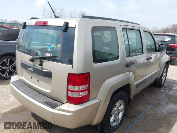 2010 Jeep Liberty Sport with VIN 1J4PN2GK2AW180299, listed as a IAAI auction lot 42057537 with 97,263 mi miles. Bid and sale history available at carsss.com. Image 4.
