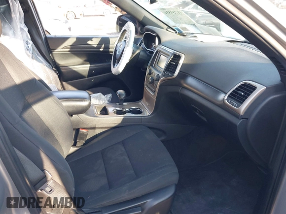 2015 Jeep Grand Cherokee Laredo with VIN 1C4RJFAG9FC775004, listed as a IAAI auction lot 41754534 with 116,893 mi miles. Bid and sale history available at carsss.com. Image 5.
