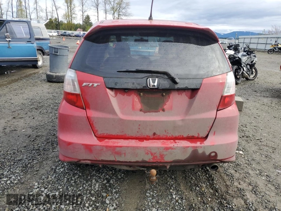 2013 Honda Fit Sport z VIN JHMGE8H69DC076469, wystawiony jako Copart lot #52234765 z przebiegiem 311 867 mil mil oraz Czysty tytuł • Clean title. Historia ofert i sprzedaży dostępna na DreamBid. Obrazek 6.