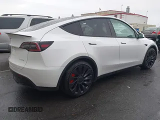 2021 Tesla Model Y Performance with VIN 5YJYGDEF2MF230374, listed as a IAAI auction lot 41708828 with 20,272 mi miles. Bid and sale history available at carsss.com. Image 4.