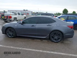2019 Acura TLX w/A-Spec Pkg z VIN 19UUB2F61KA000932, wystawiony jako IAAI lot #42164064 z przebiegiem 79 080 mil mil oraz . Historia ofert i sprzedaży dostępna na DreamBid. Obrazek 14.