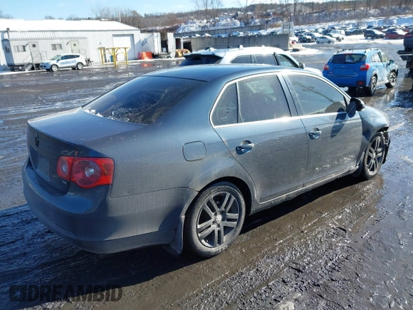2005 Volkswagen Jetta with VIN 3VWST71K95M634210, listed as a IAAI auction lot 41552649 with 296,831 mi miles and . Bid and sale history available at DreamBid. Image 4.