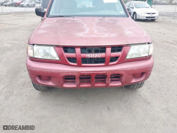 2004 Isuzu Rodeo S with VIN 4S2CK58W644317345, listed as a IAAI auction lot 41940961 with 1 mi miles. Bid and sale history available at carsss.com. Image 6.
