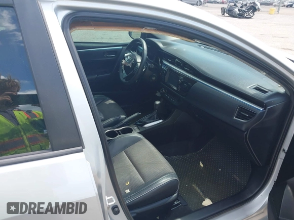 2014 Toyota Corolla L with VIN 5YFBURHE9EP160912, listed as a IAAI auction lot 42159372 with 125,863 mi miles and . Bid and sale history available at DreamBid. Image 5.