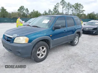 2005 Mazda Tribute i with VIN 4F2YZ02Z85KM19097, listed as a IAAI auction lot 41547466 with 121,709 mi miles and . Bid and sale history available at carsss.com. Image 2.
