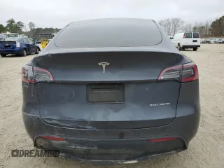 2022 Tesla Model Y Long Range with VIN 7SAYGAEE6NF523835, listed as a Copart auction lot 47874565 with Not Provided miles and Salvage Title. Bid and sale history available at DreamBid. Image 6.