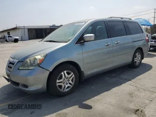 2005 Honda Odyssey EX-L with VIN 5FNRL38665B106065, listed as a Copart auction lot 58948945 with 139,100 mi miles and Salvage title. Bid and sale history available at DreamBid. Image 1.