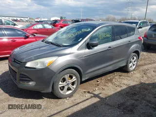 2013 Ford Escape SE with VIN 1FMCU9GX5DUD72758, listed as a IAAI auction lot 41983665 with 282,604 mi miles. Bid and sale history available at carsss.com. Image 2.