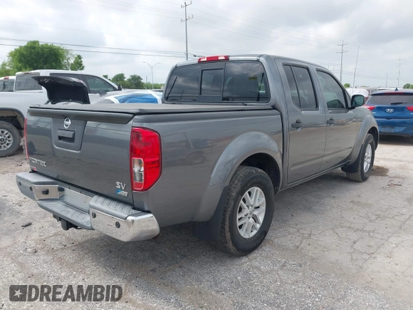 2019 Nissan Frontier SV with VIN 1N6DD0ER7KN781986, listed as a IAAI auction lot 42131724 with 120,535 mi miles and . Bid and sale history available at DreamBid. Image 4.