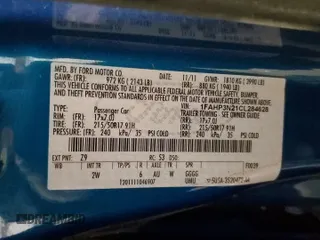 2012 Ford Focus Titanium with VIN 1FAHP3N21CL284628, listed as a Copart auction lot 46572065 with 143,443 mi miles and Salvage Title. Bid and sale history available at carsss.com. Image 13.
